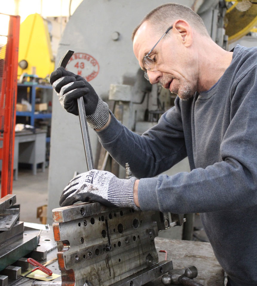 man working on a metal fabrication