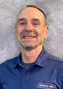 male employee in blue shirt