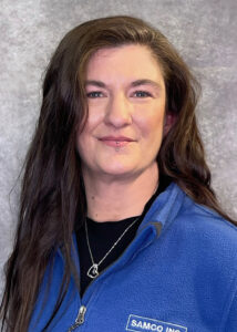 female employee in blue shirt